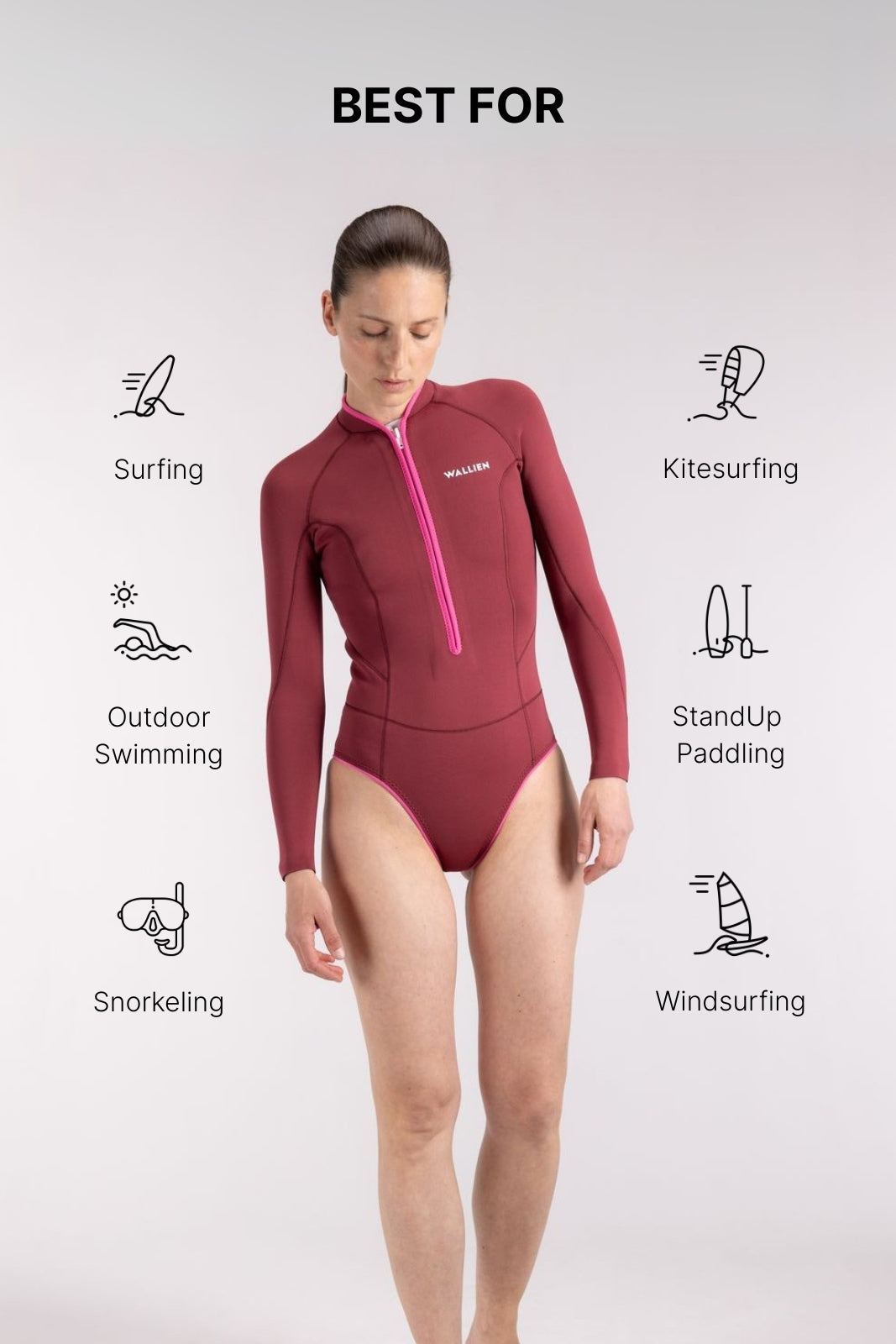 Model in red Yulex® springsuit wetsuit, posing in front view for women's surfwear shoot, eco-friendly gear, studio background