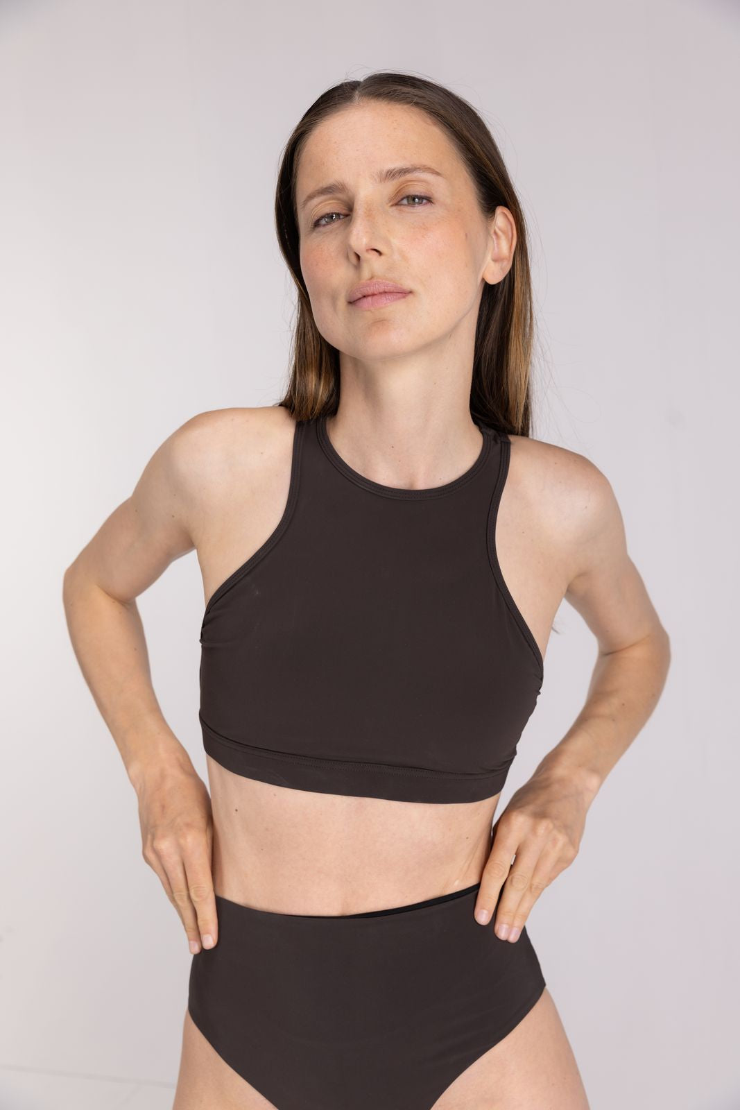 Coffee high waist bikini bottom with racer top styled for athletic fit, made for performance swim on white studio background